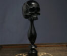 Skull pipe tamper