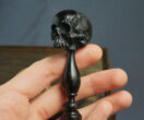 Skull pipe tamper