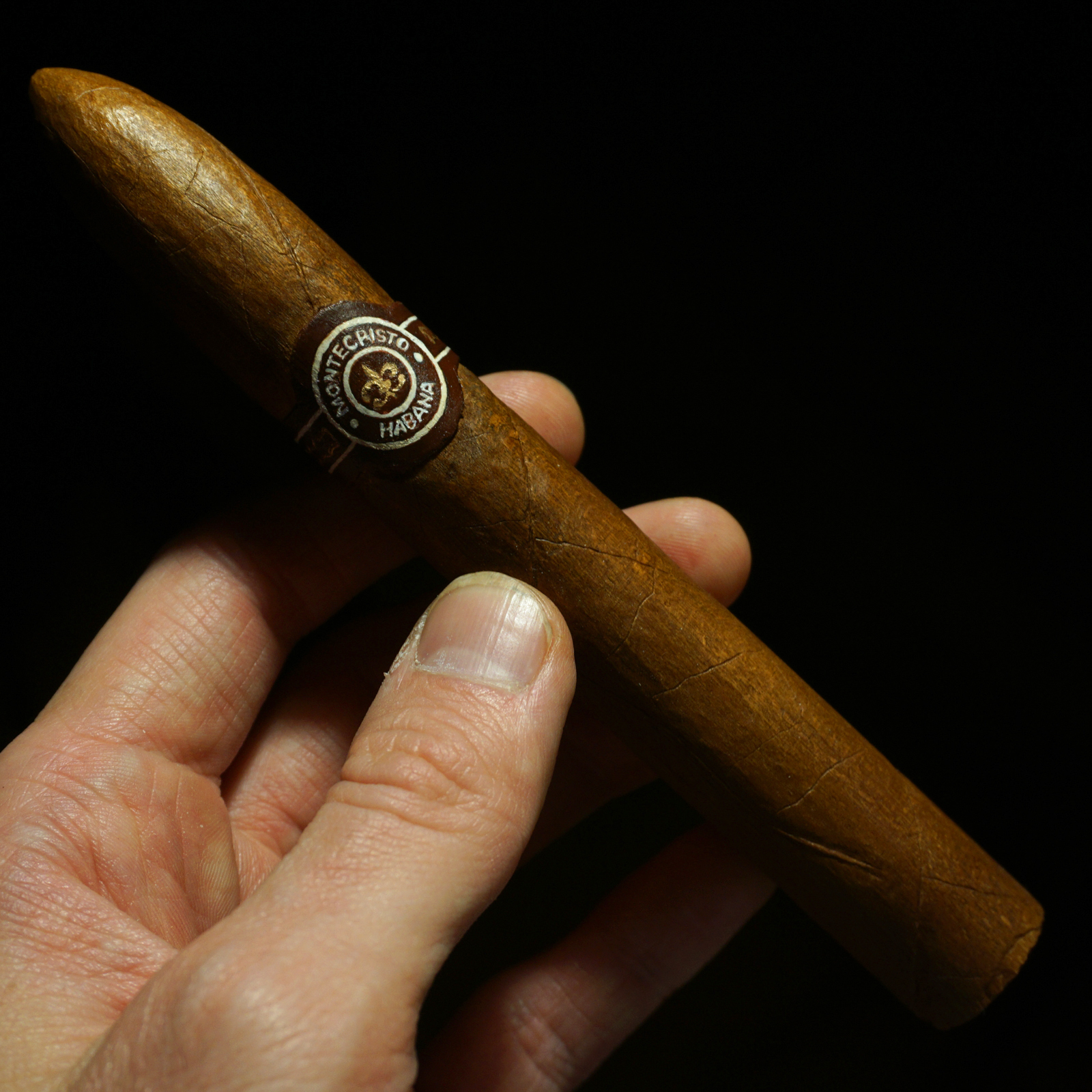 Wooden cigar. Hand carved