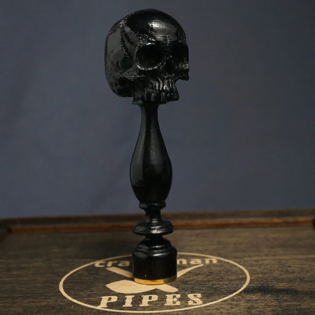 Skull pipe tamper